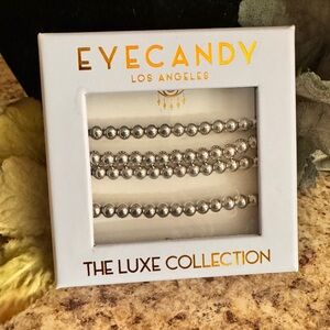 Eye Candy Los Angeles The Luxe Collection. Four Elastic Silver Beaded Bracelets.